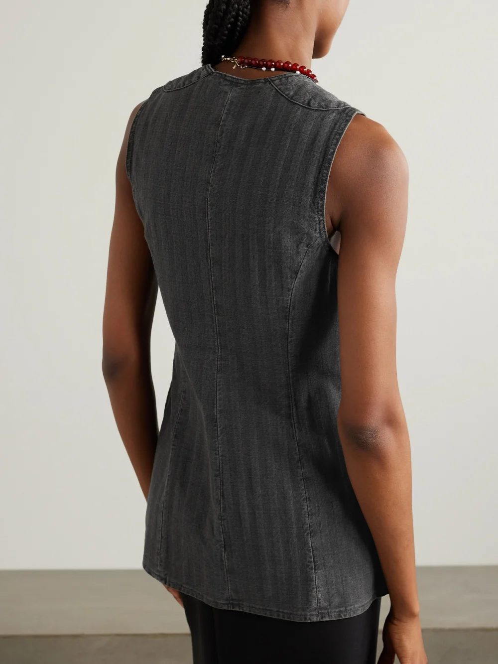 Back view of the Our Legacy Zip-detailed Striped Denim Tank