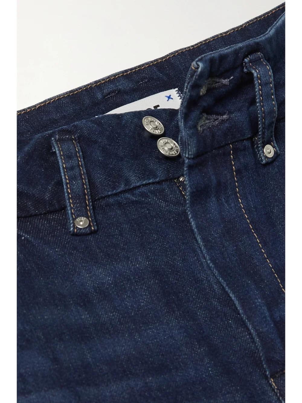 Close-up detail of the Paige Dion High-rise Flared Cargo Jeans