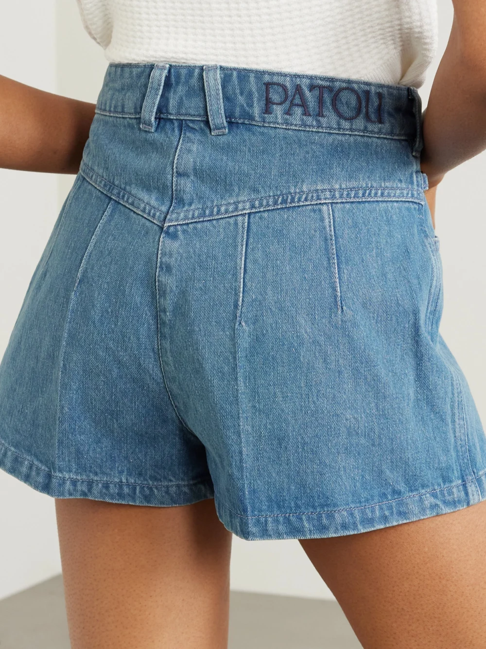 Back view of the Patou Embellished Denim Shorts