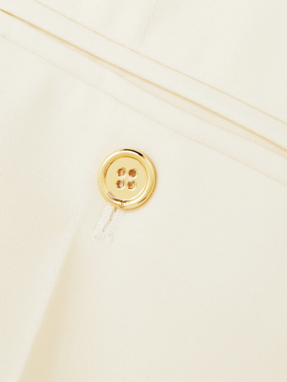 Close-up detail of the Patou Stretch Wool-twill Tapered Pants