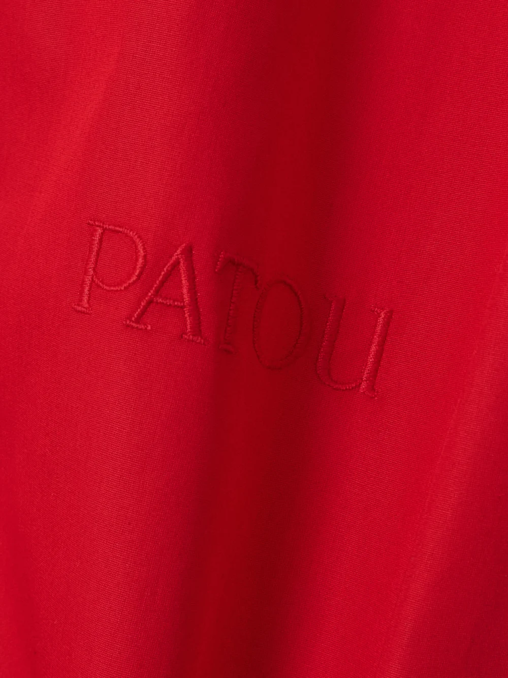 Close-up detail of the Patou Tie-neck Cotton-poplin Blouse