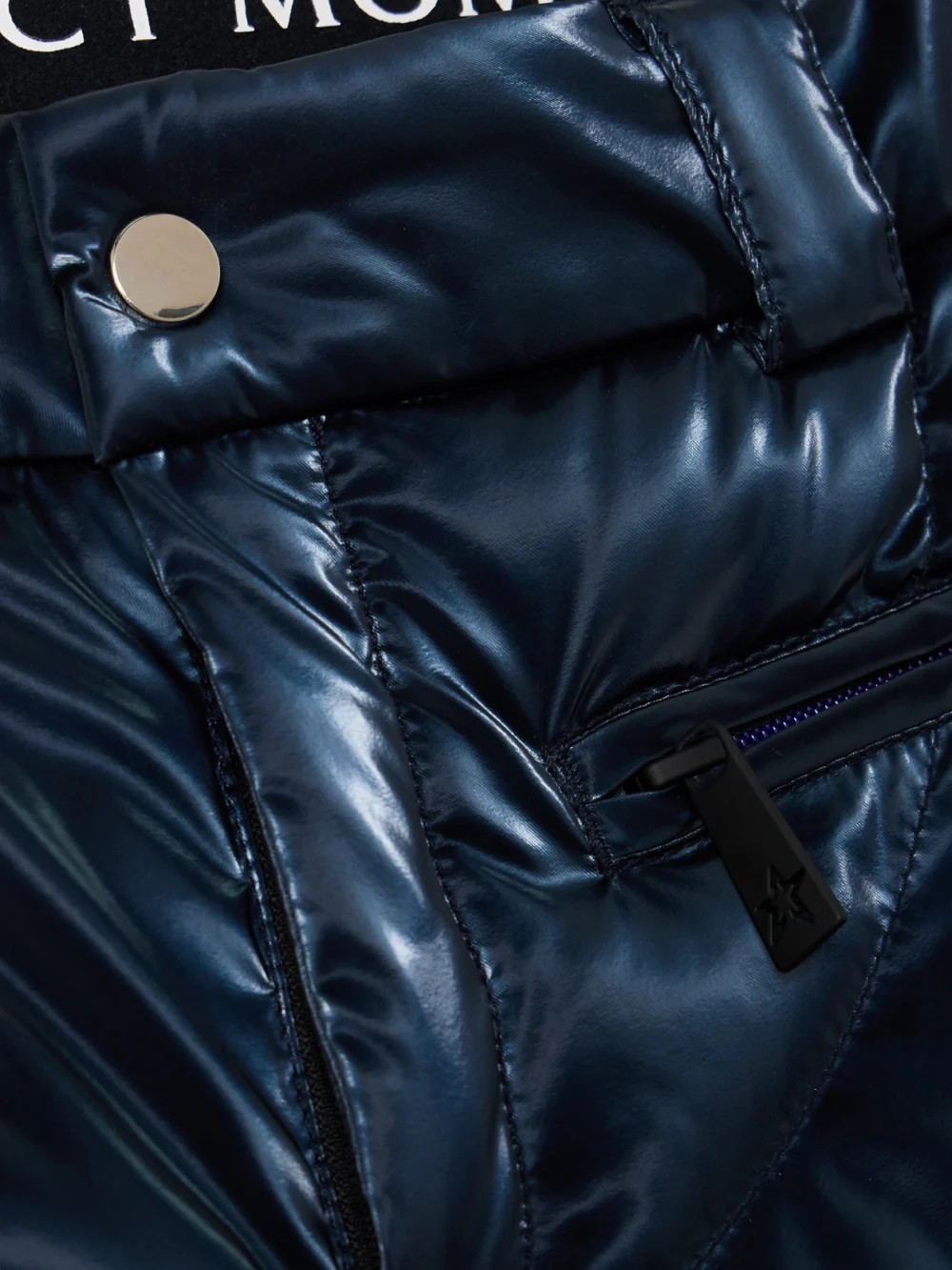 Close-up detail of the Perfect Moment + Johnnie Walker Carving Air Quilted Flared Ski Pants