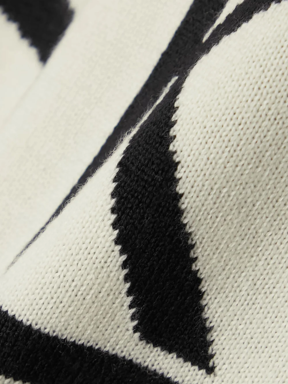 Close-up detail of the Perfect Moment Schild Intarsia Merino Wool Turtleneck Sweater
