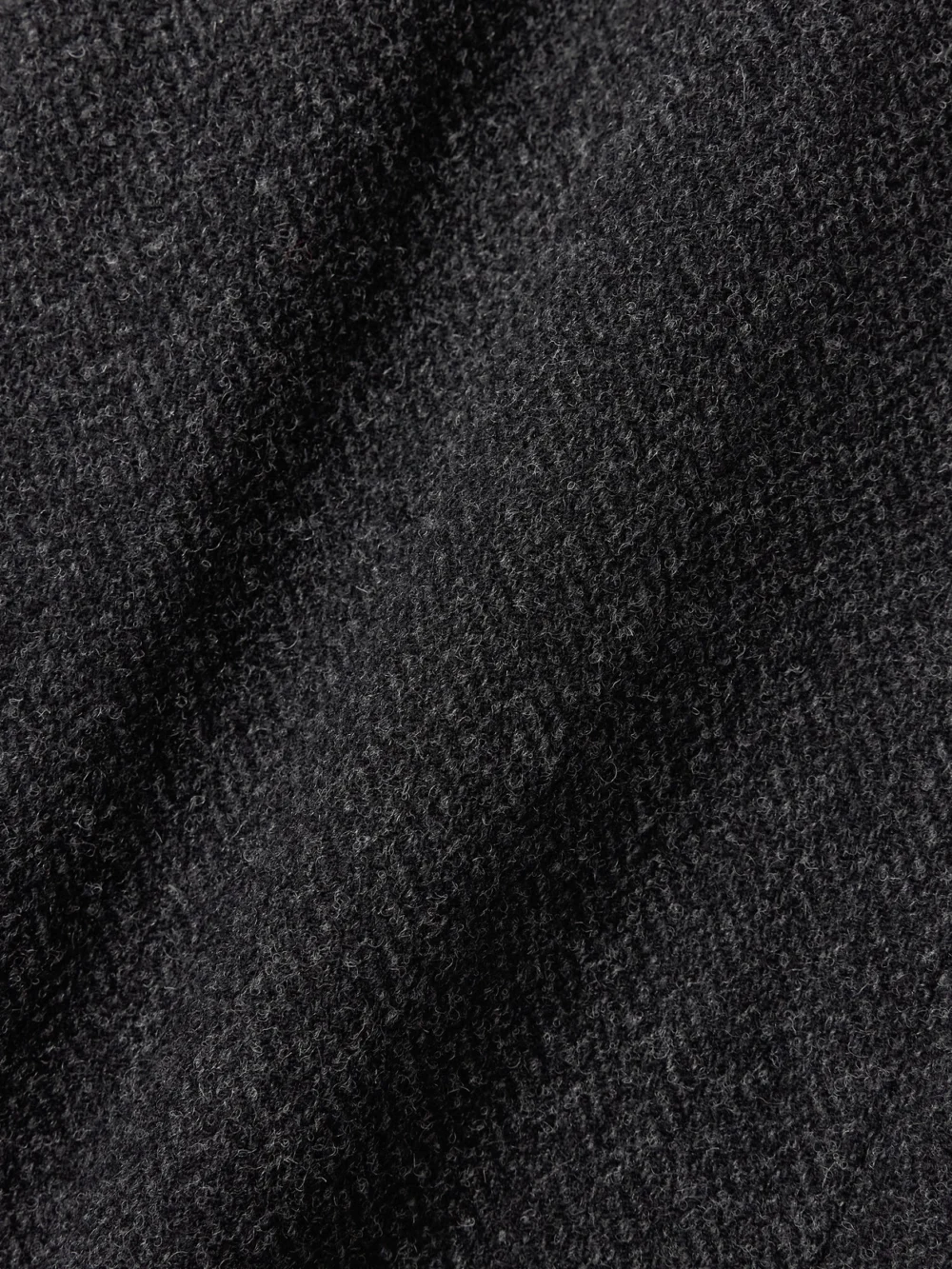 Close-up detail of the Petar Petrov Spy Herringbone Wool Skirt