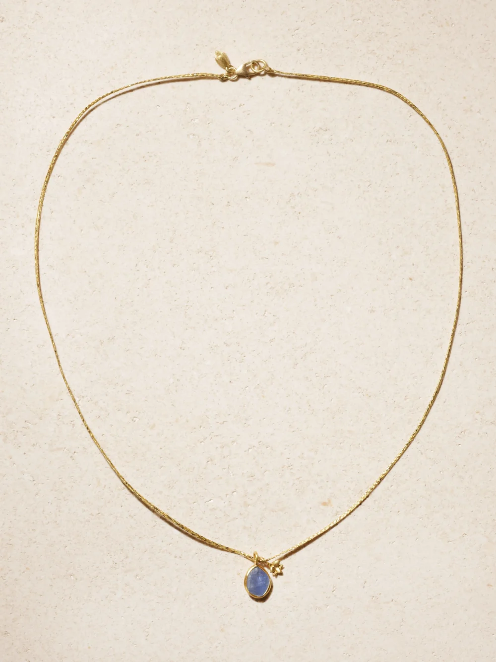 Close-up detail of the Pippa Small 18-karat Gold, Cord and Sapphire Necklace