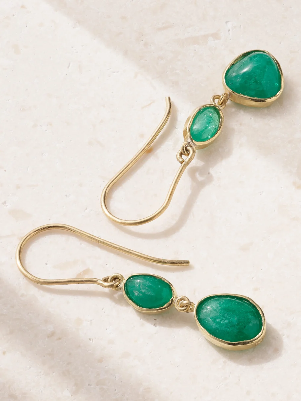 Close-up detail of the Pippa Small Double Drop 18-karat Gold Emerald Earrings