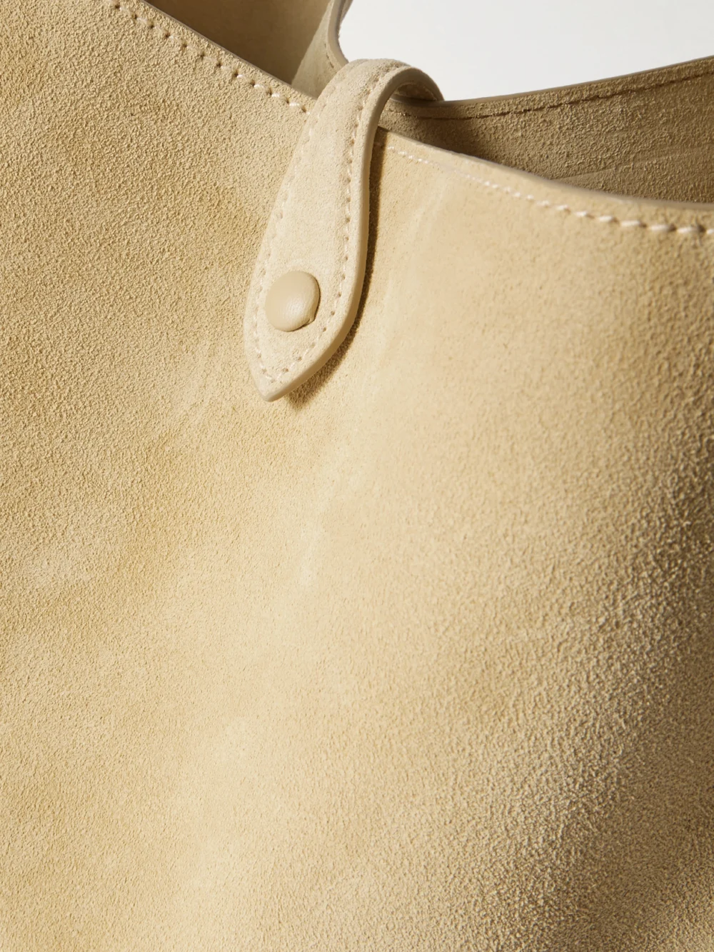 Close-up detail of the Polo Ralph Lauren Debossed Suede Shoulder Bag