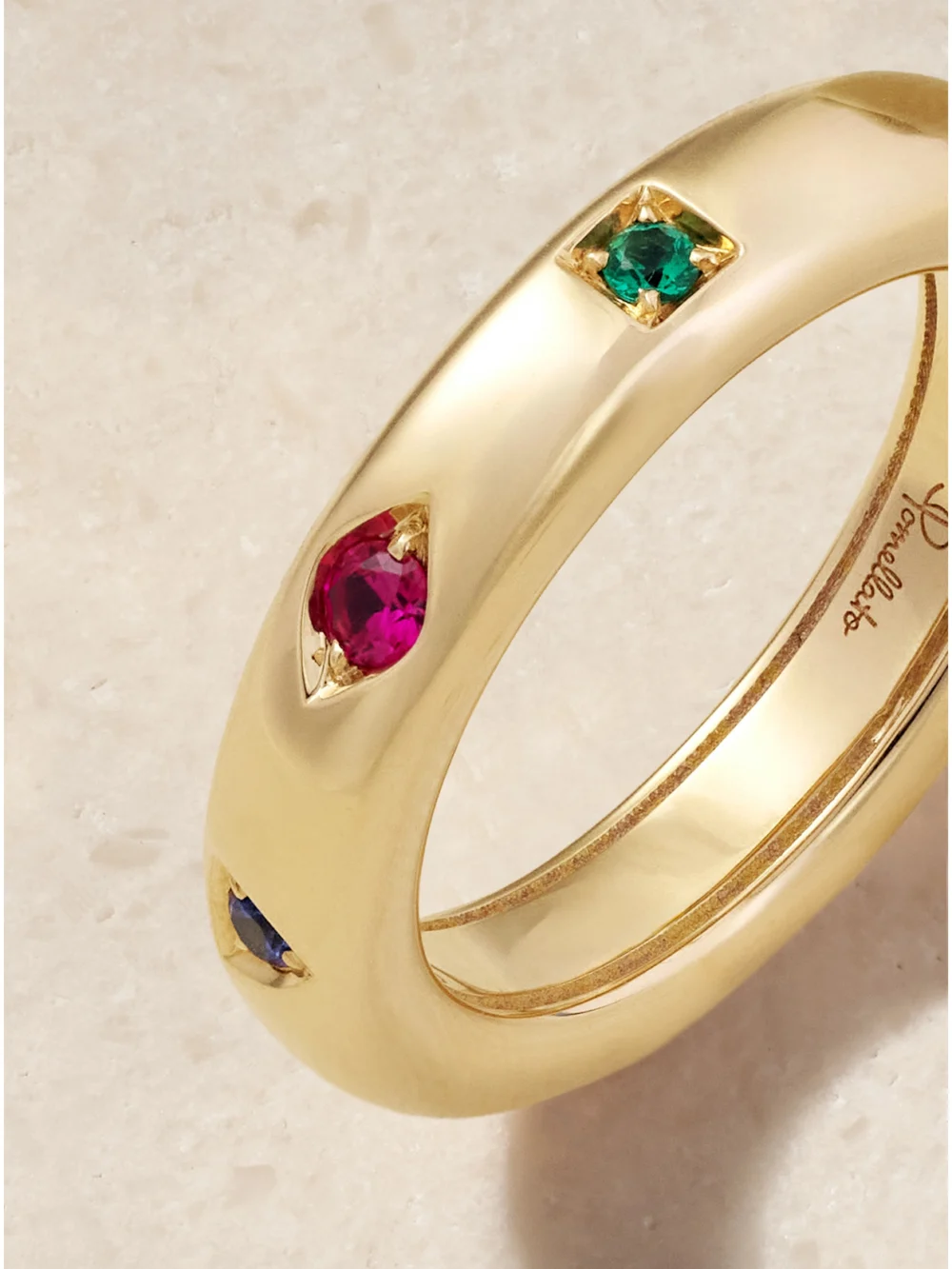 Close-up detail of the Pomellato Iconica 18-karat Rose Gold, Ruby, Sapphire and Emerald Ring