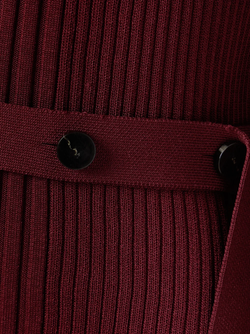 Close-up detail of the Proenza Schouler Lauryn Belted Ribbed-knit Maxi Dress