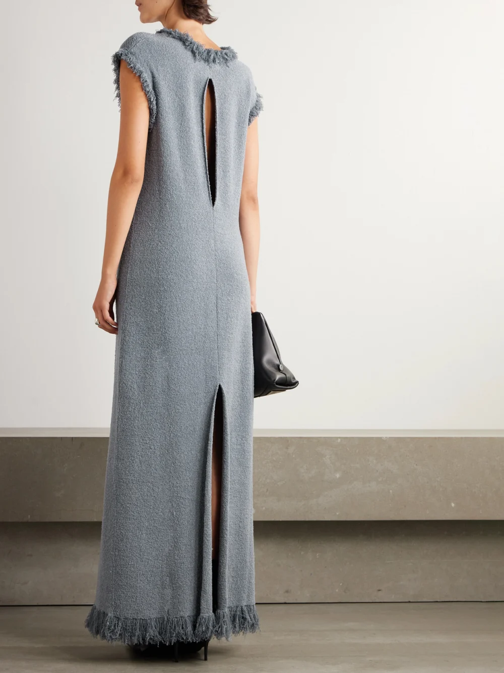 Back view of the Proenza Schouler Toni Cut-out Fringed Bouclé Maxi Dress