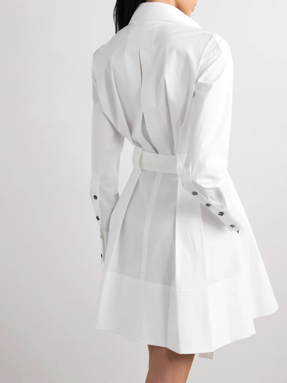 Back view of the Proenza Schouler Viola Belted Pleated Cotton-blend Poplin Mini Dress