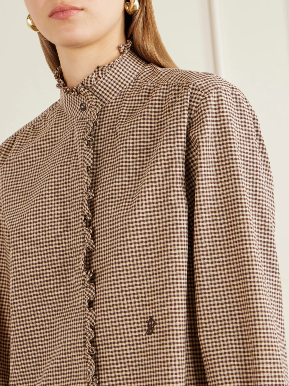 Close-up detail of the Purdey Logo-embroidered Ruffled Checked Cotton Shirt