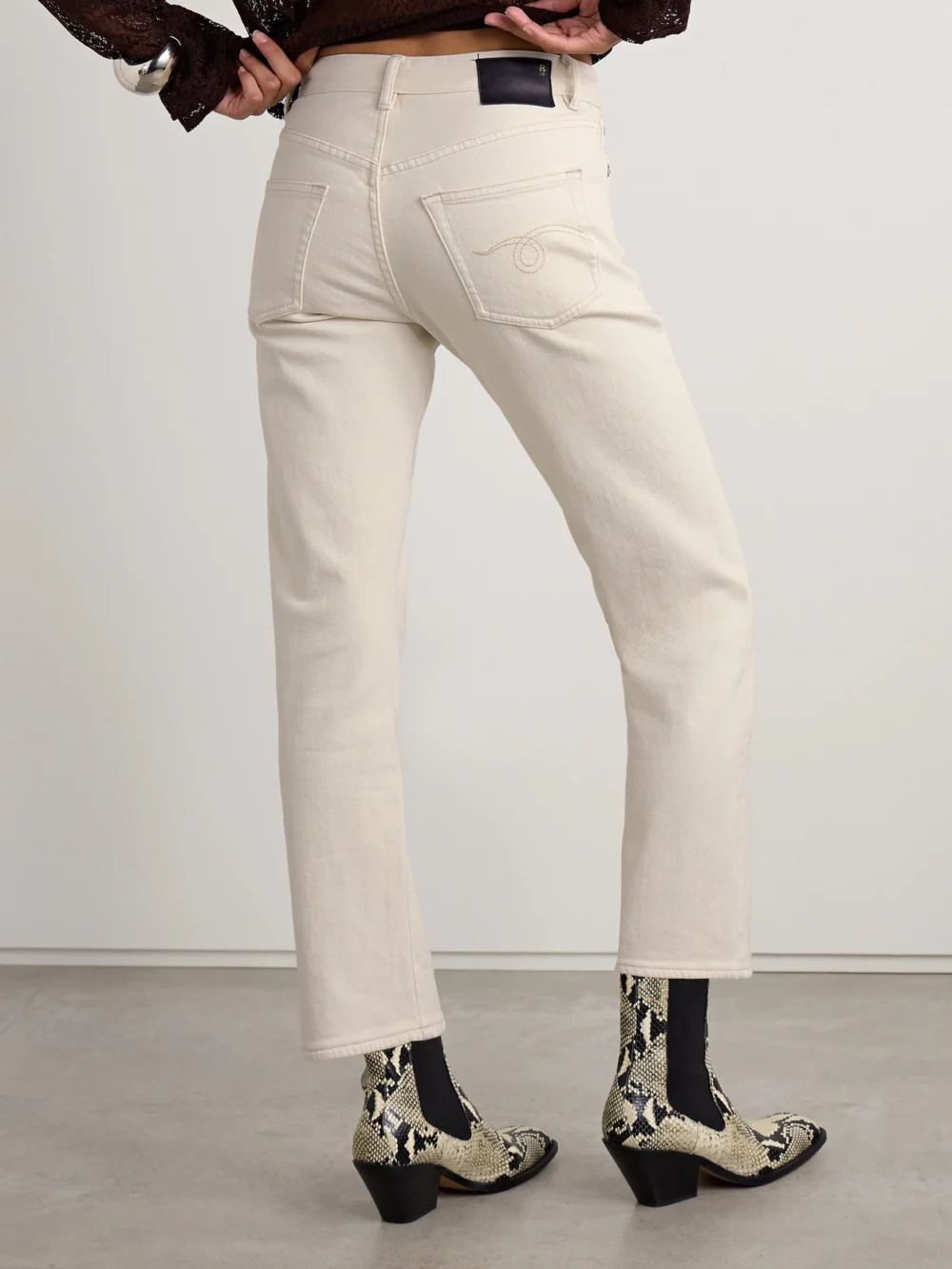 Back view of the R13 Romeo Cropped Mid-rise Flared Jeans