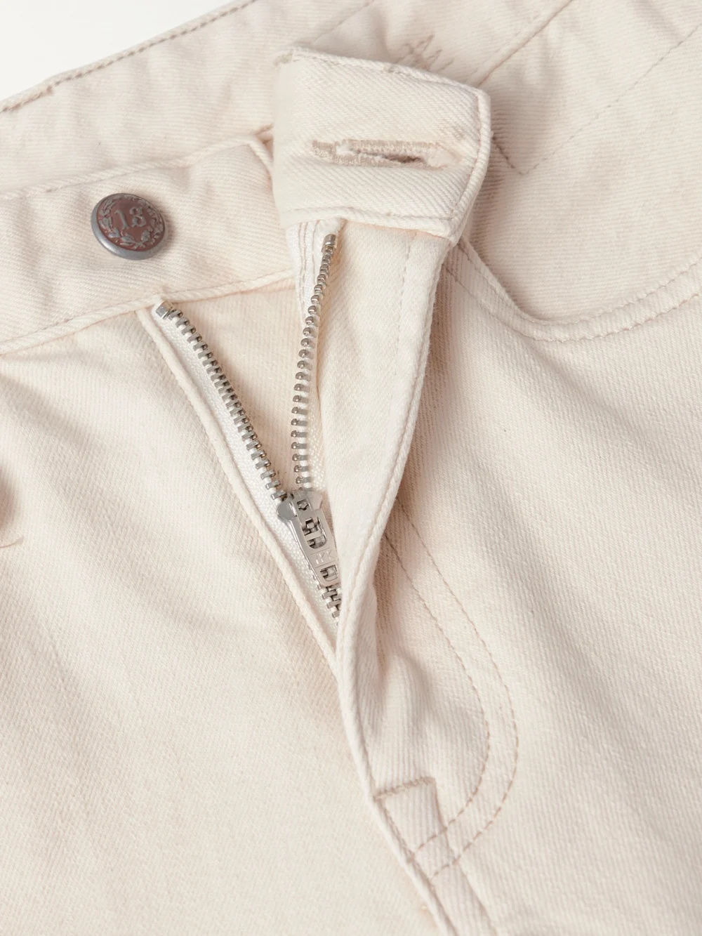 Close-up detail of the R13 Romeo Cropped Mid-rise Flared Jeans