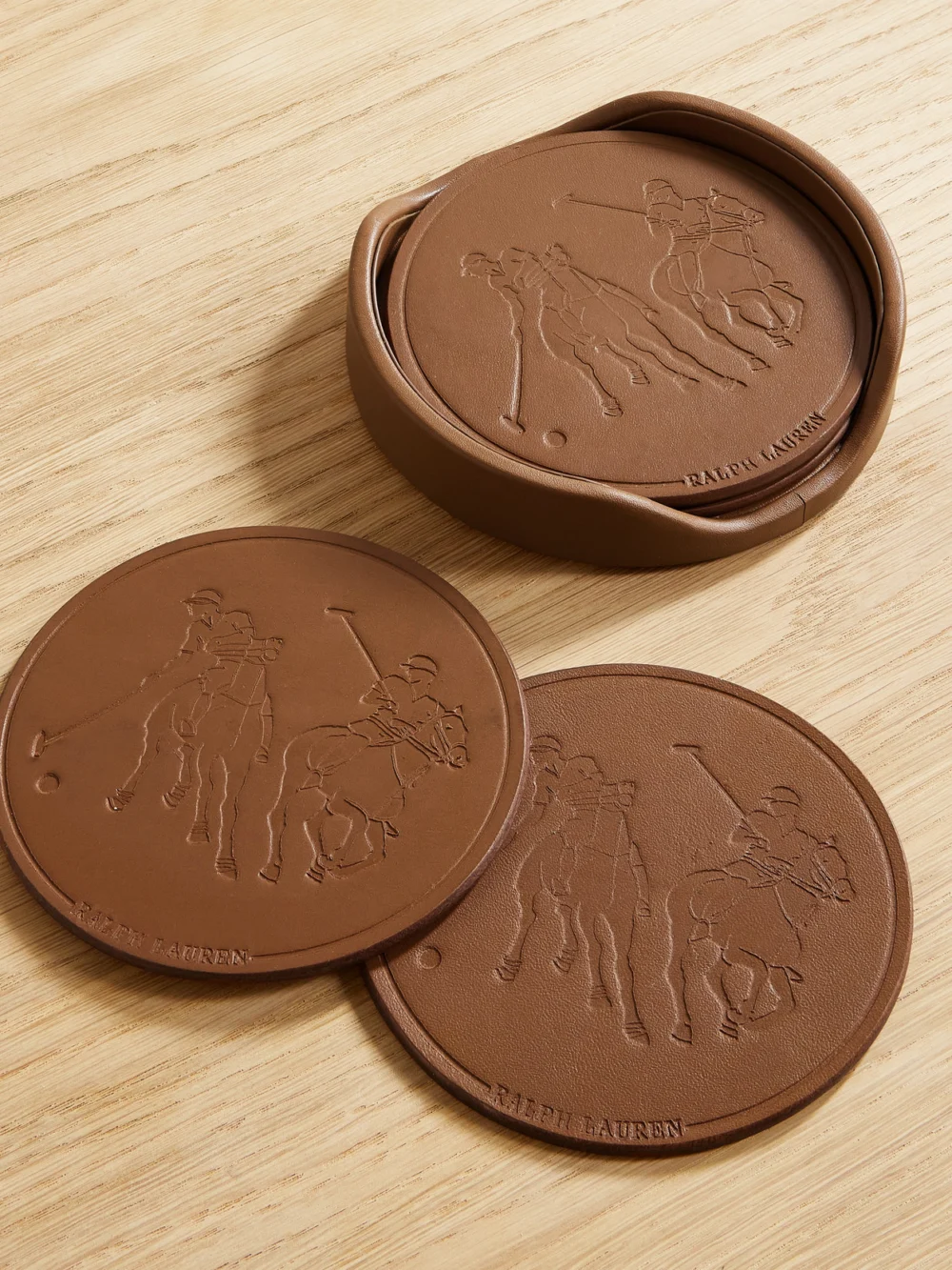 Close-up detail of the Ralph Lauren Home Garrett Set of Four Debossed Leather Coasters