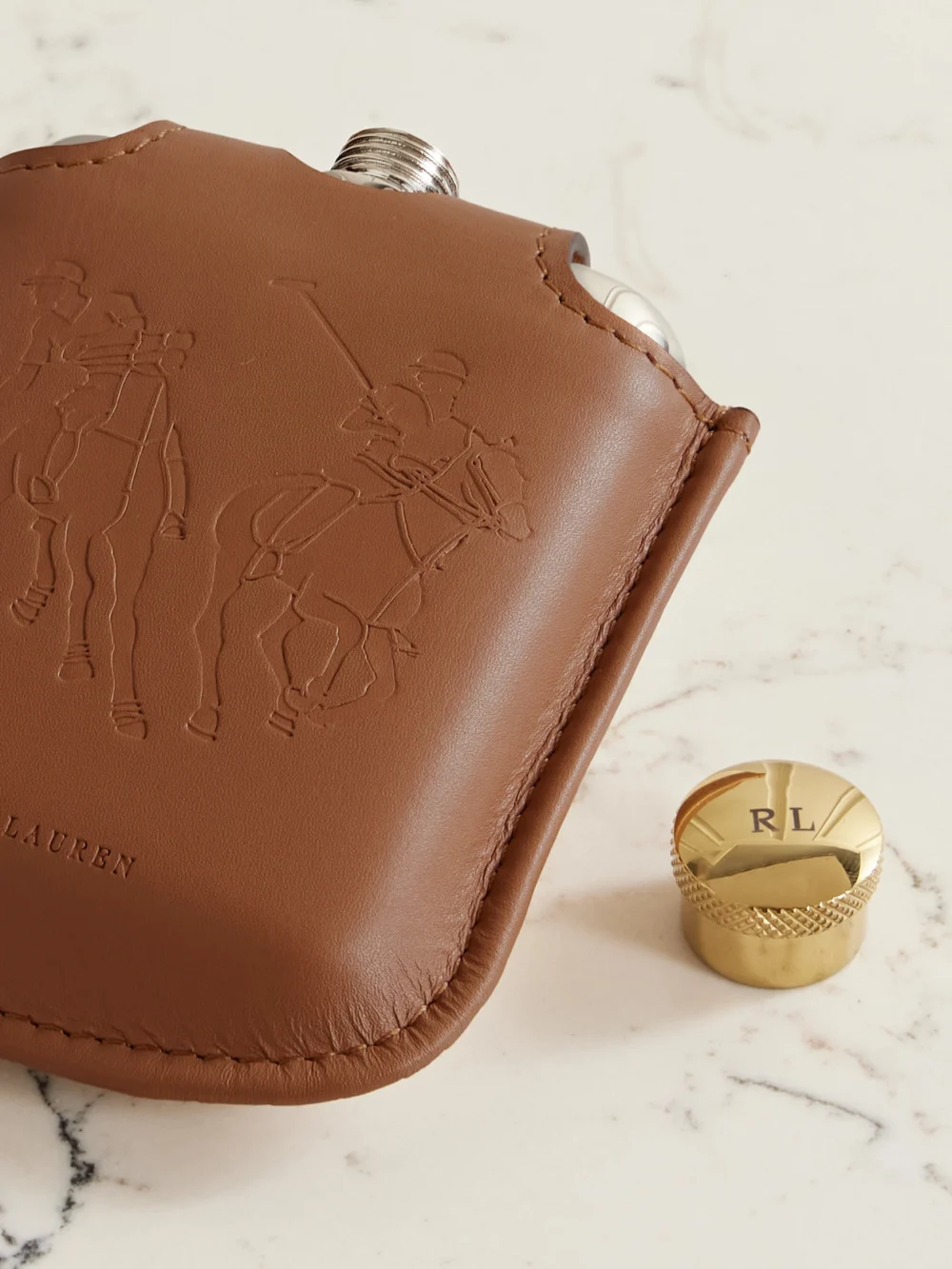 Close-up detail of the Ralph Lauren Home Garrett Silver-tone and Gold-tone Flask and Leather and Canvas Case