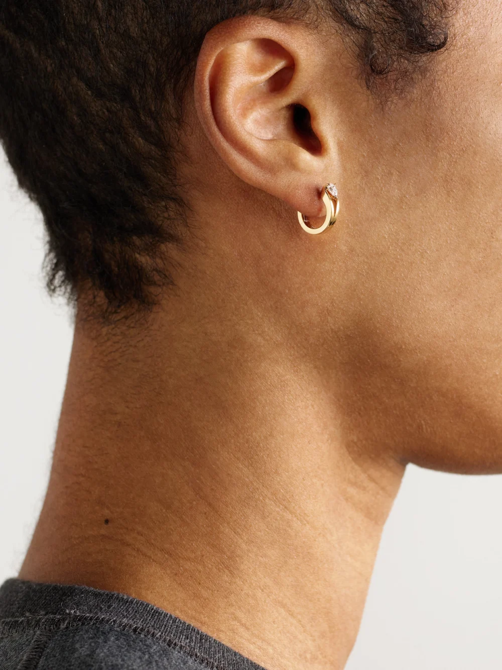 Repossi Serti Inversé 18-karat Rose Gold Diamond Single Earring, styled view
