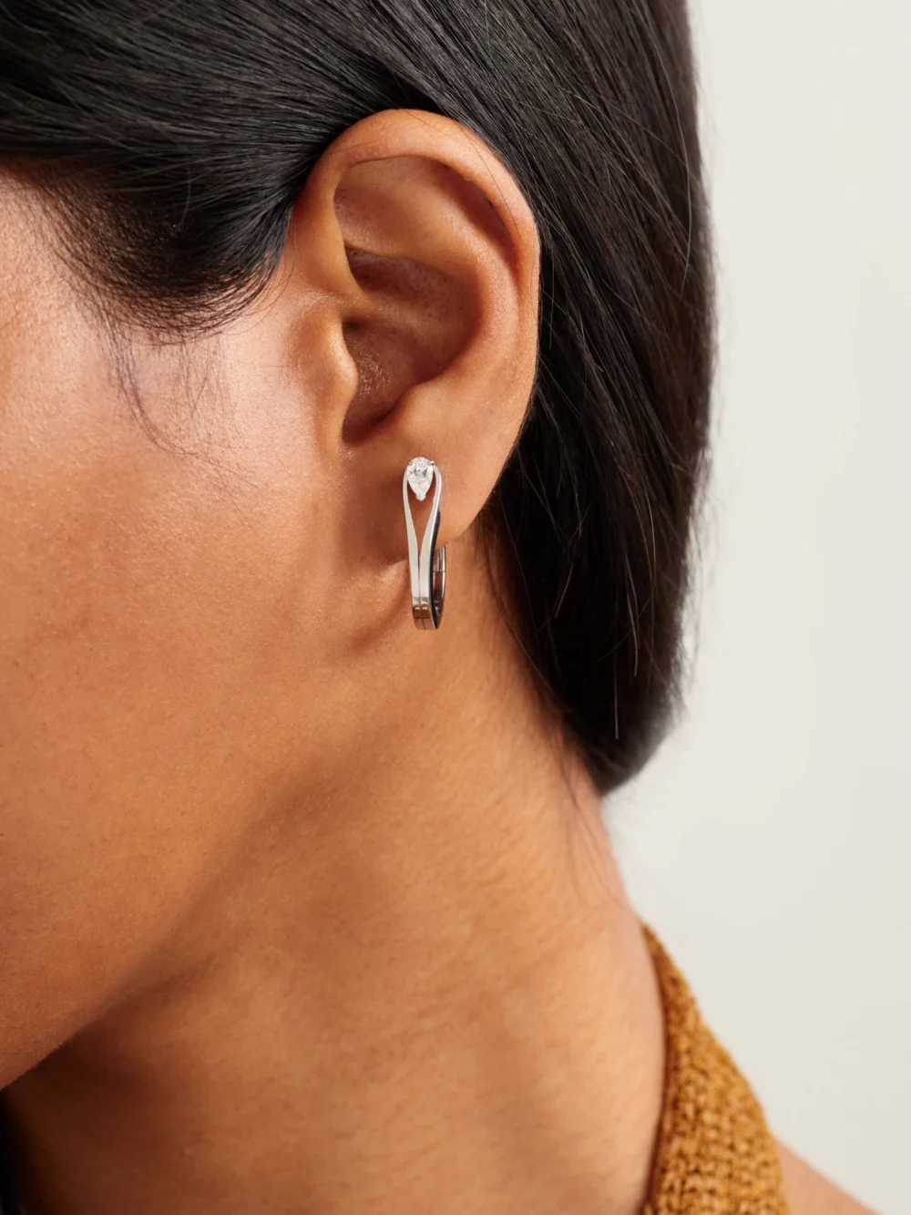 Repossi Serti Inversé 18-karat White Gold Diamond Single Earring, styled view