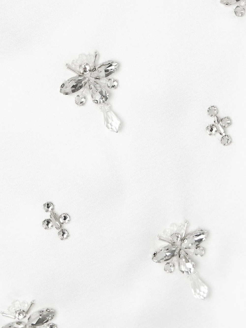 Close-up detail of the Retrofête Elise Strapless Embellished Satin-crepe Gown