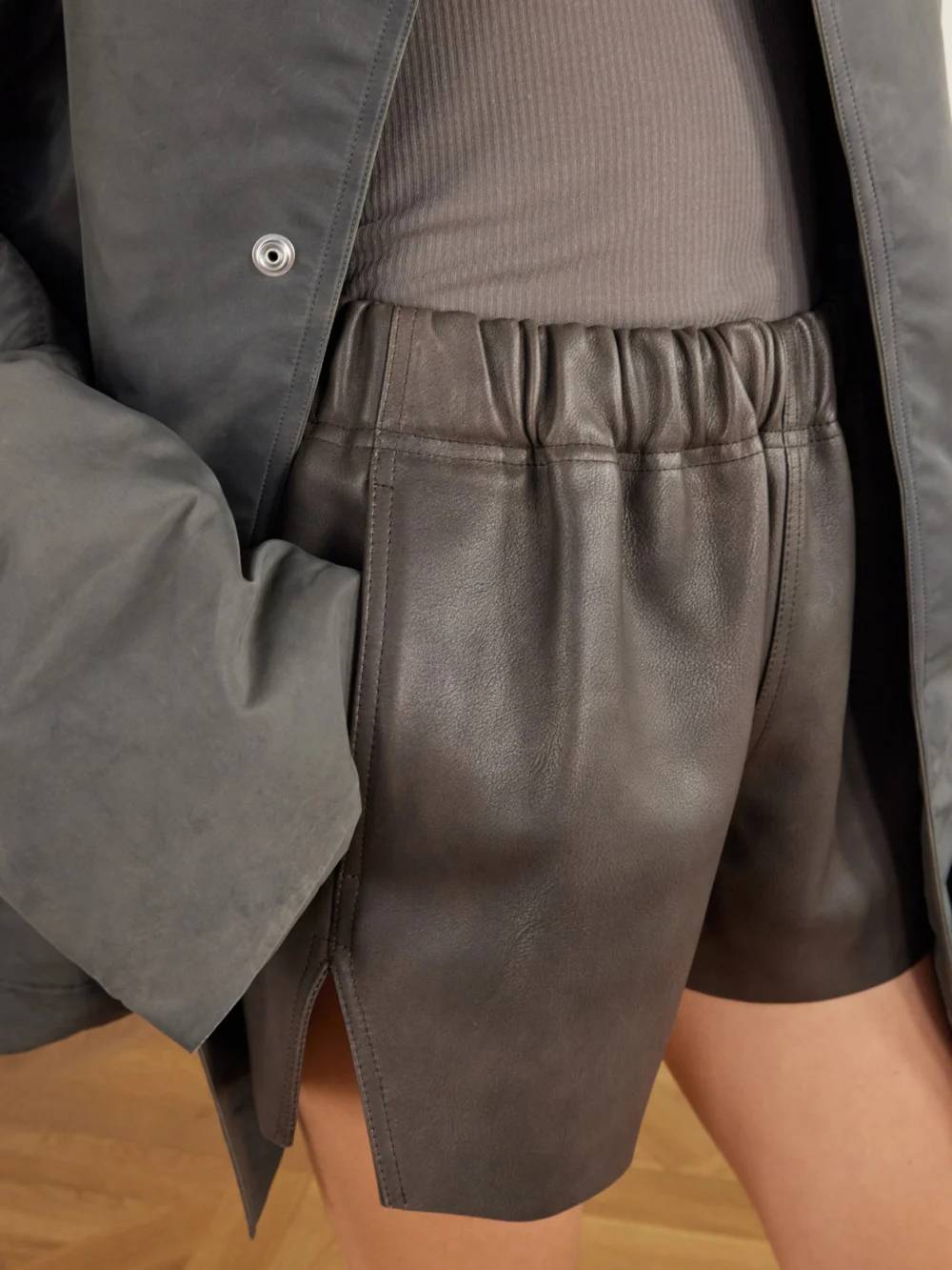 Close-up detail of the Rick Owens Delave Gathered Textured-leather Shorts