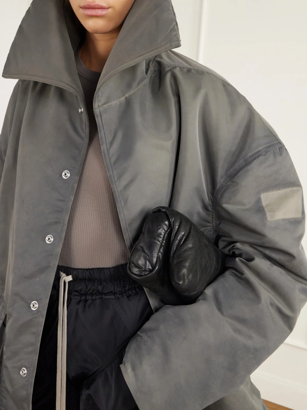 Close-up detail of the Rick Owens Dracucollar Oversized Distressed Padded Shell Parka