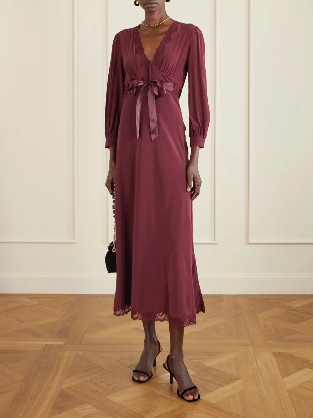Rixo Adaline Bow-detailed Lace-trimmed Silk Maxi Dress, worn by a model
