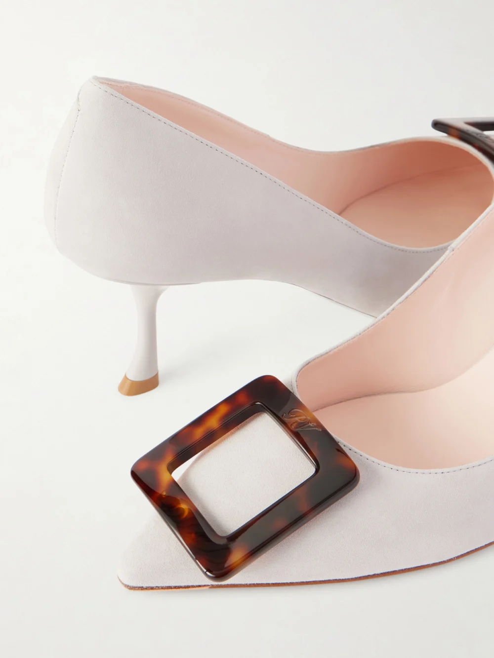 Close-up detail of the Roger Vivier Viv in the City 65 Buckled Suede Pumps