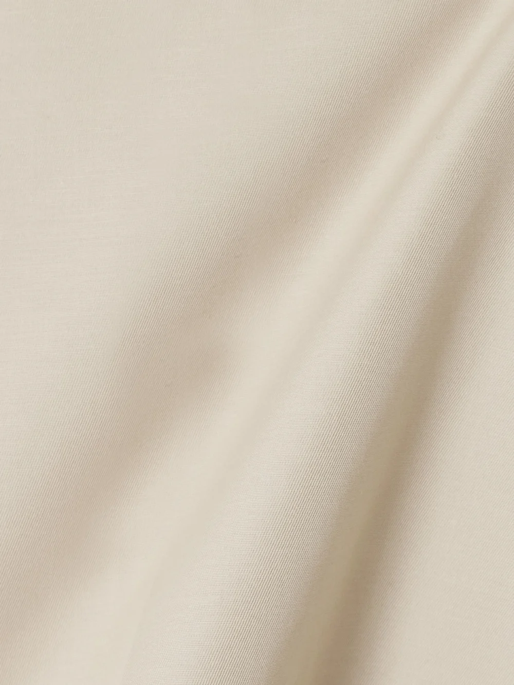 Close-up detail of the Róhe Cotton-twill Wide-leg Pants