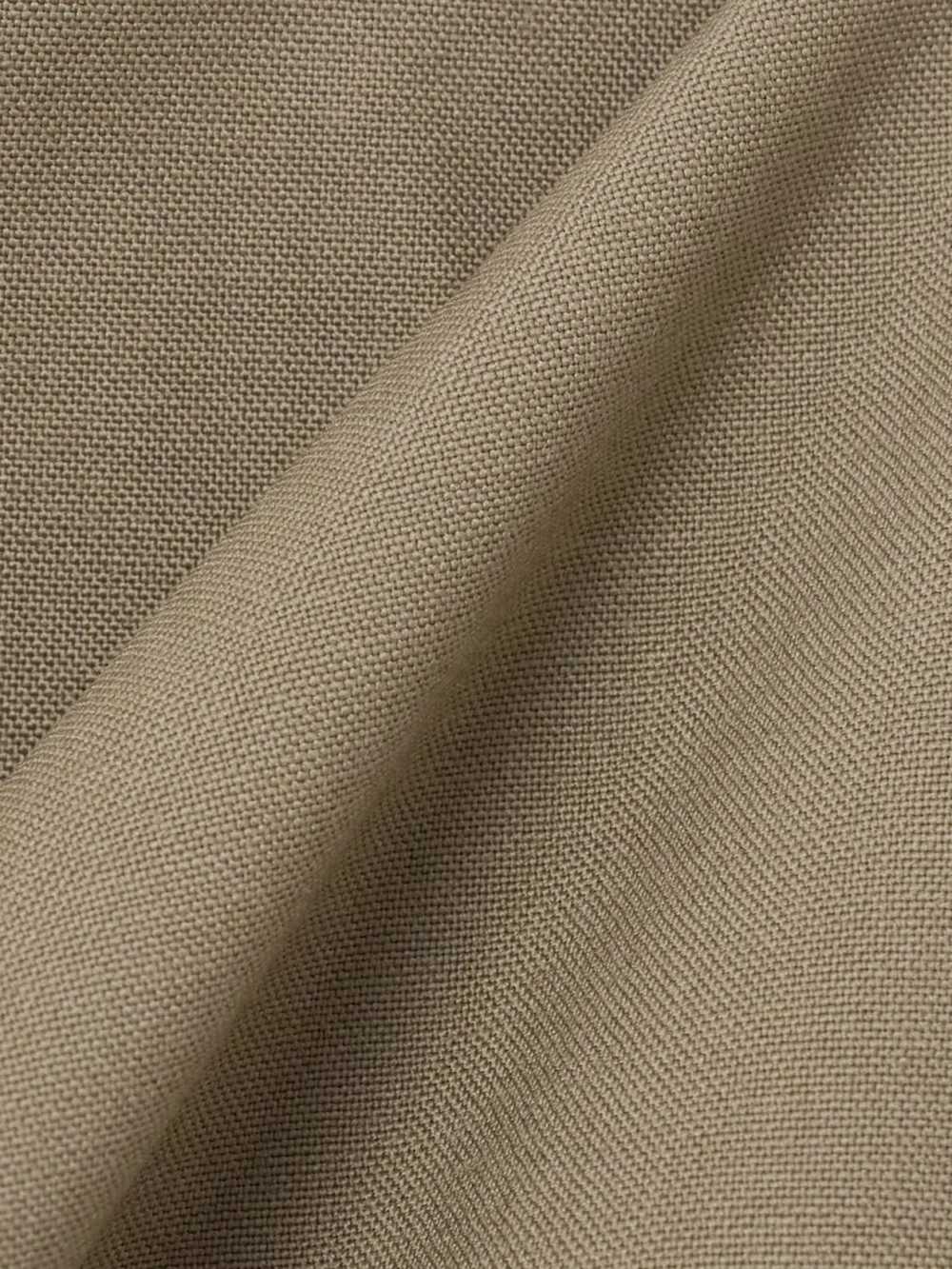 Close-up detail of the Róhe Draped Wool Blouse