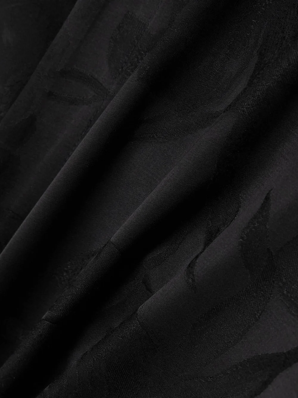 Close-up detail of the Róhe Floral Satin-jacquard Wrap Shirt