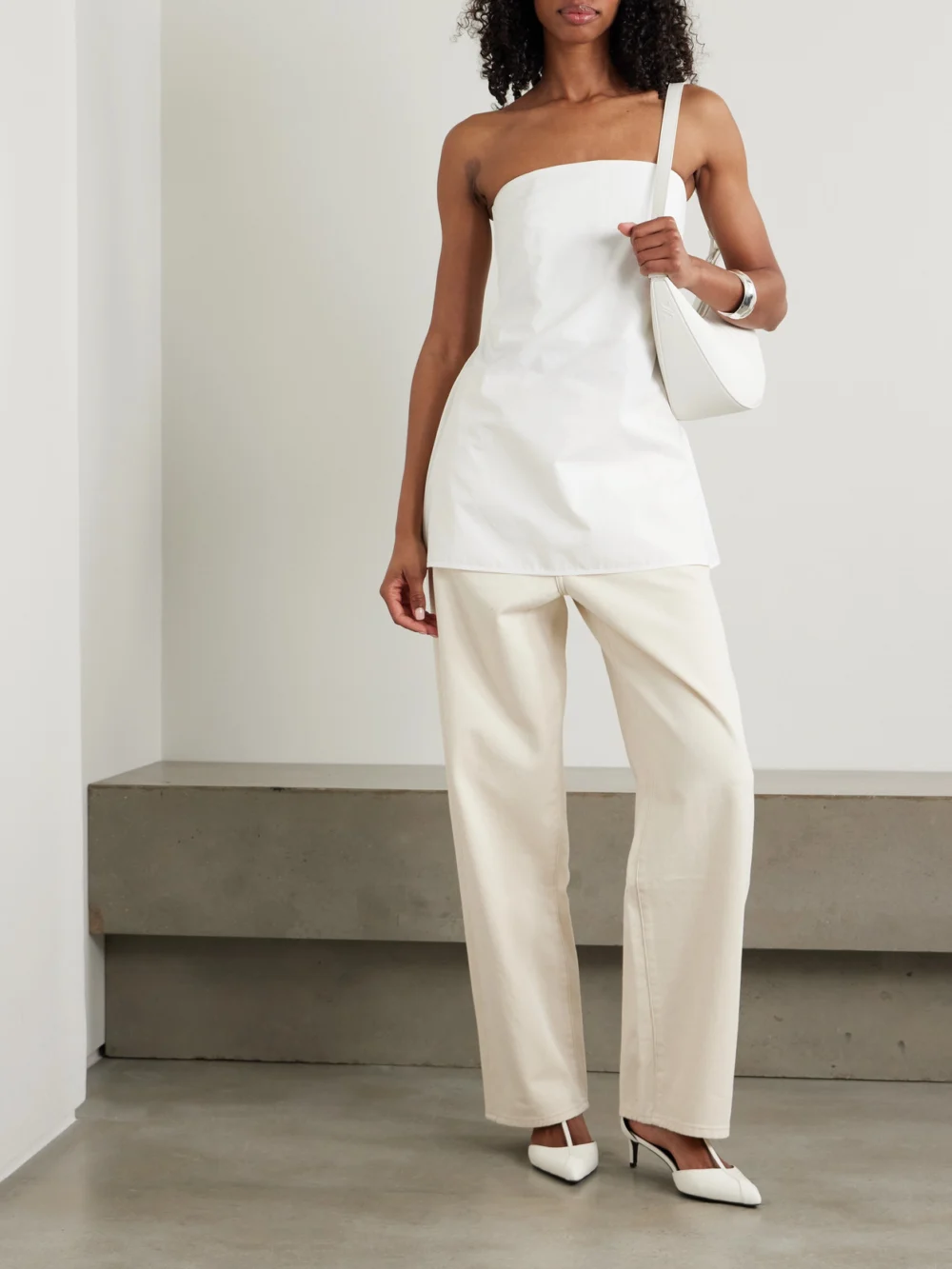Róhe Peplum Cotton-poplin Bustier Top, worn by a model
