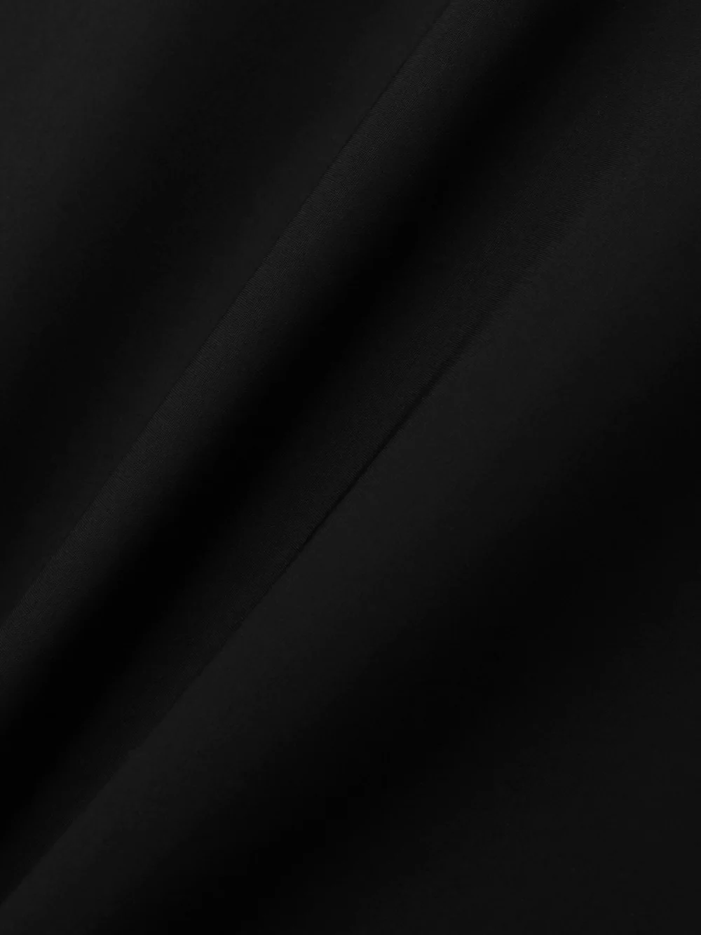 Close-up detail of the Róhe Recycled Stretch-scuba Maxi Dress