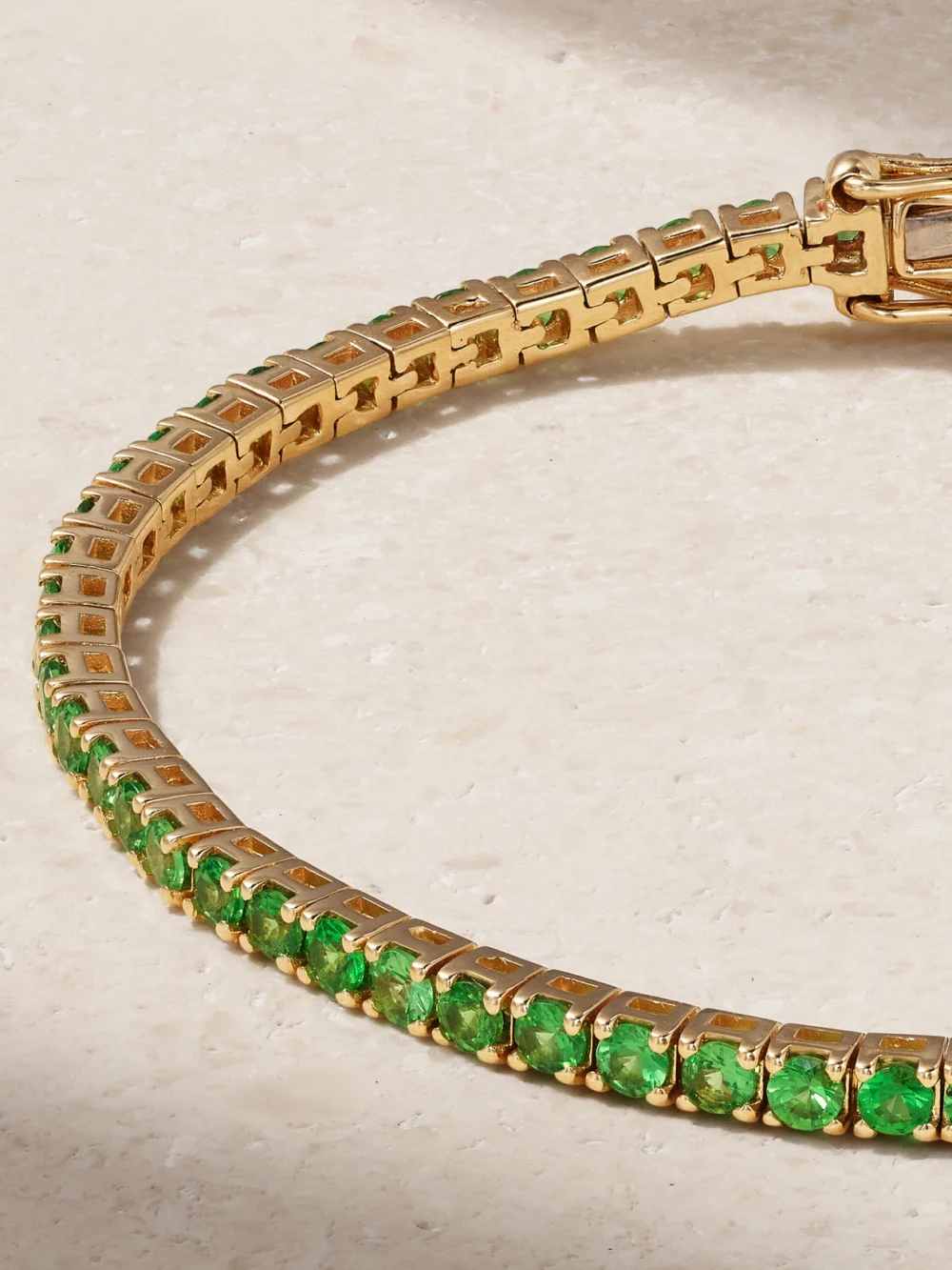 Close-up detail of the Roxanne First 14-karat Gold Tsavorite Tennis Bracelet