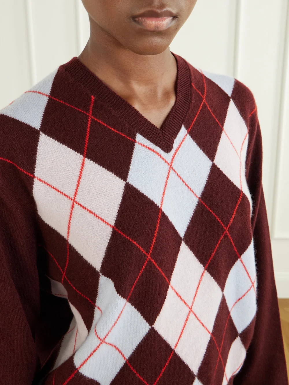 Close-up detail of the Rùadh The Academy Checked Cashmere Sweater