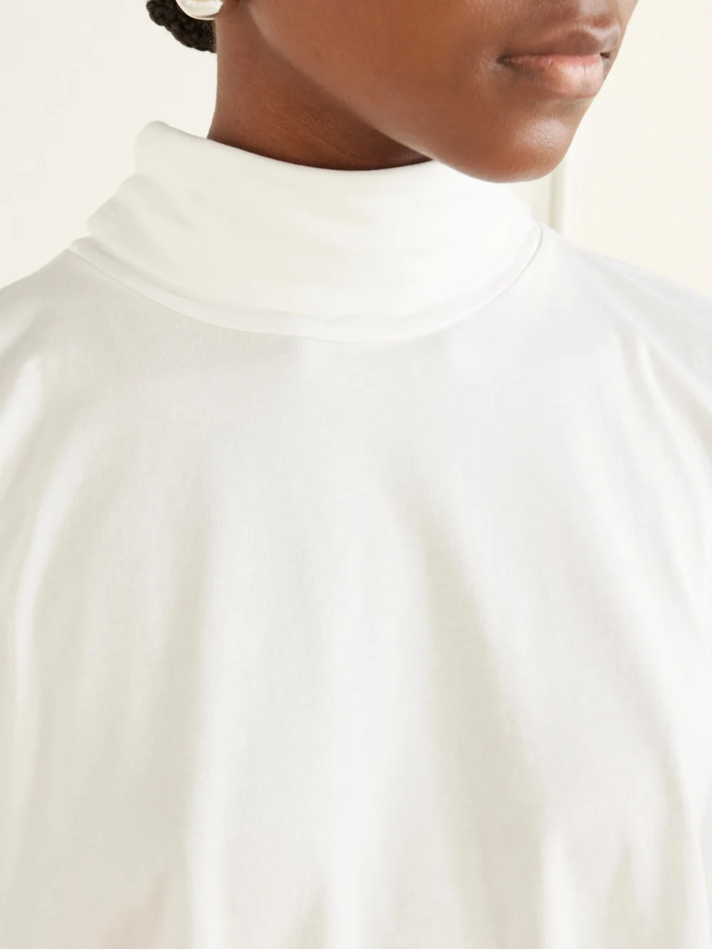 Close-up detail of the Rùadh The Honne Organic Cotton Blouse