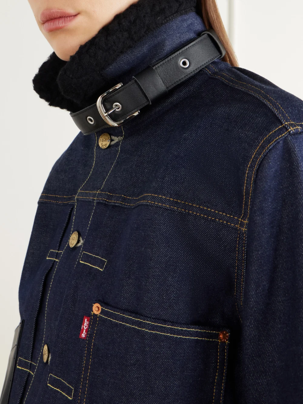 Close-up detail of the Sacai + Levi's Plush and Leather-trimmed Denim Jacket
