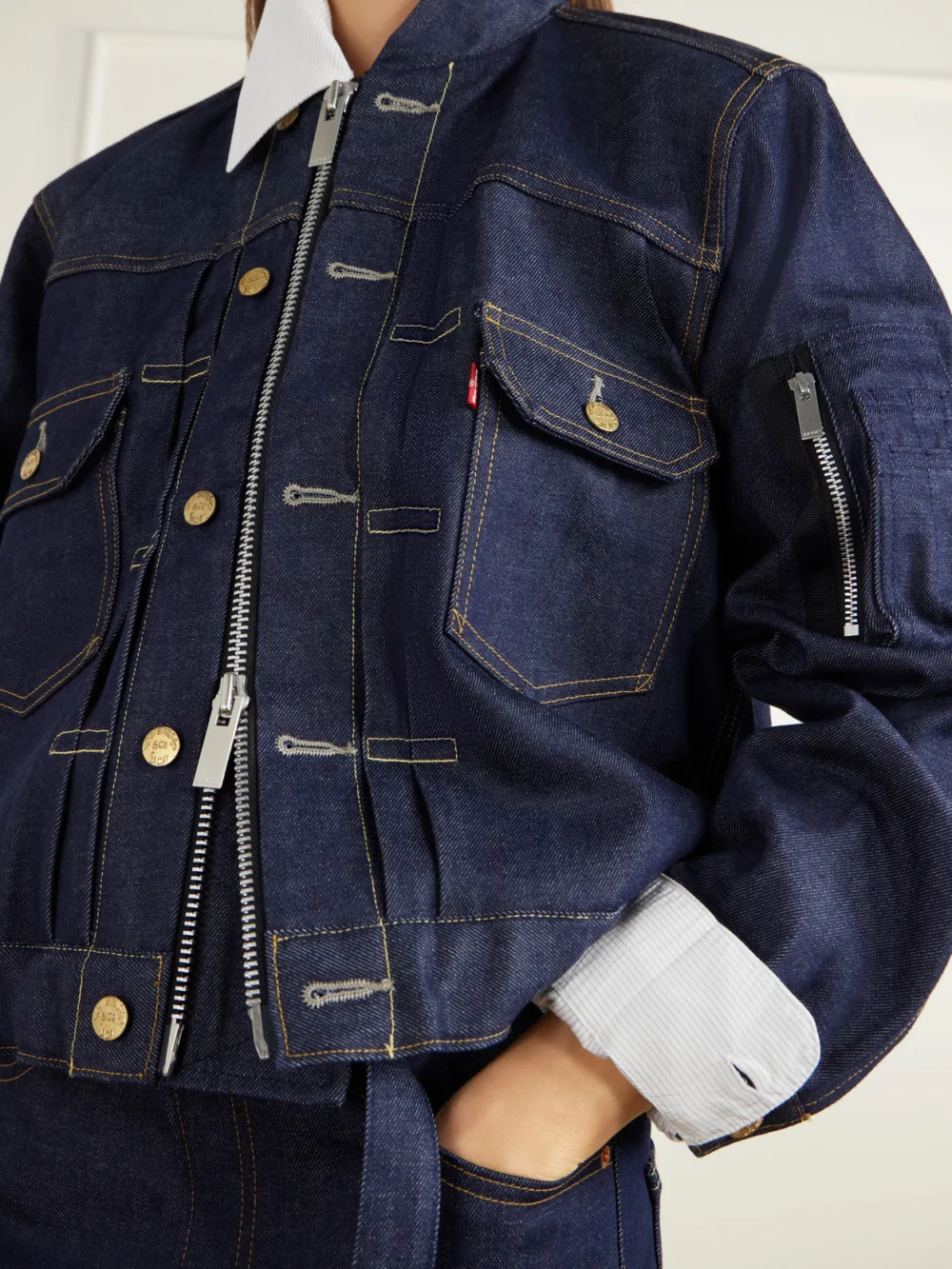 Close-up detail of the Sacai + Levi's Washed Denim Bomber Jacket