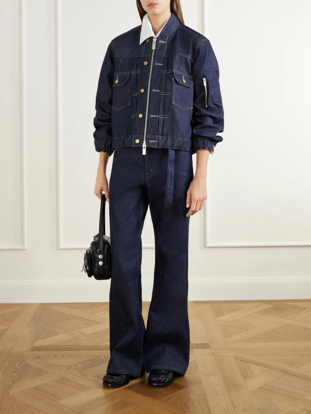 Sacai + Levi's Washed Denim Bomber Jacket, worn by a model