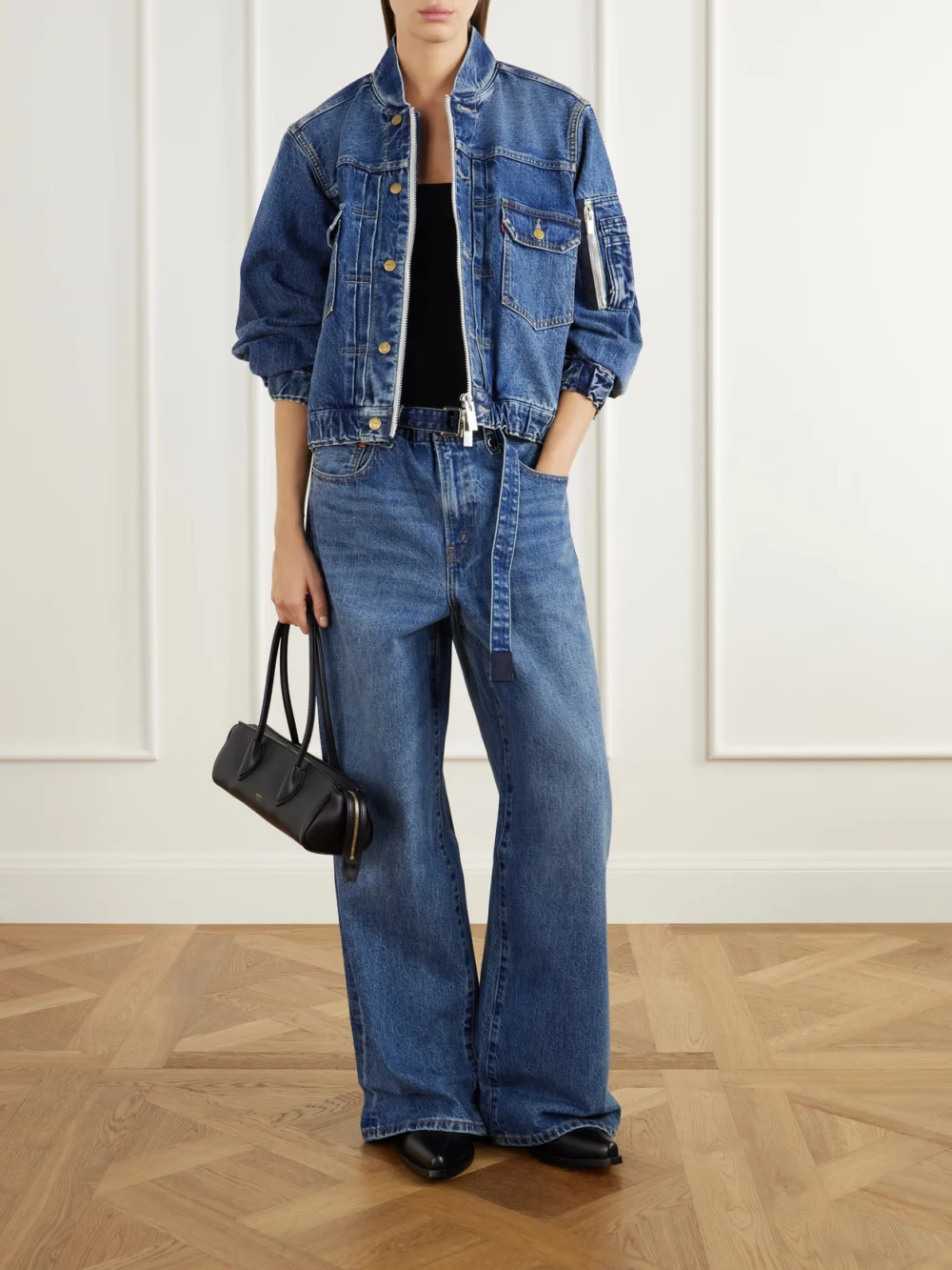 Sacai + Levi's Washed Denim Bomber Jacket, worn by a model