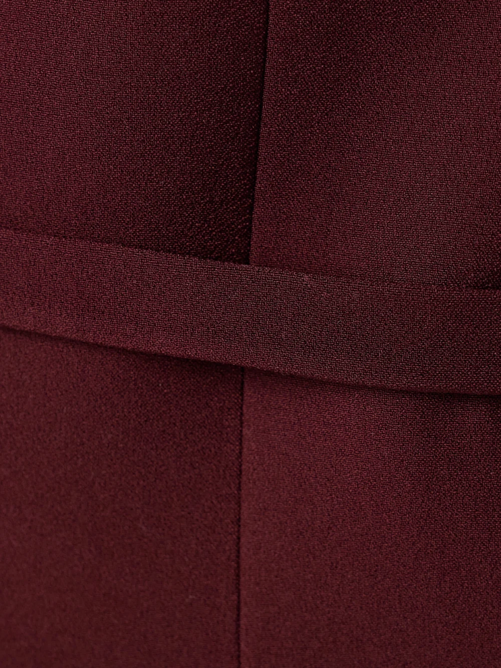 Close-up detail of the Safiyaa Odele Asymmetric Draped Crepe Halterneck Top