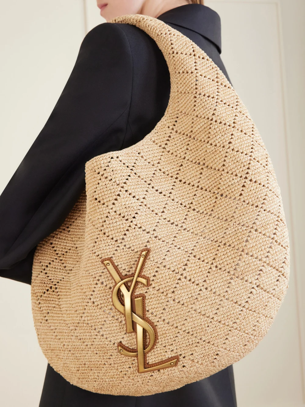 Saint Laurent Icare Cassandre-embellished Woven Raffia Shoulder Bag, styled view