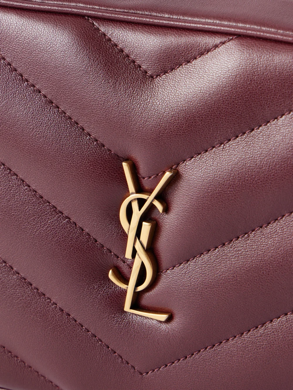 Close-up detail of the Saint Laurent Loulou Cassandre-embellished Matelassé Leather Shoulder Bag