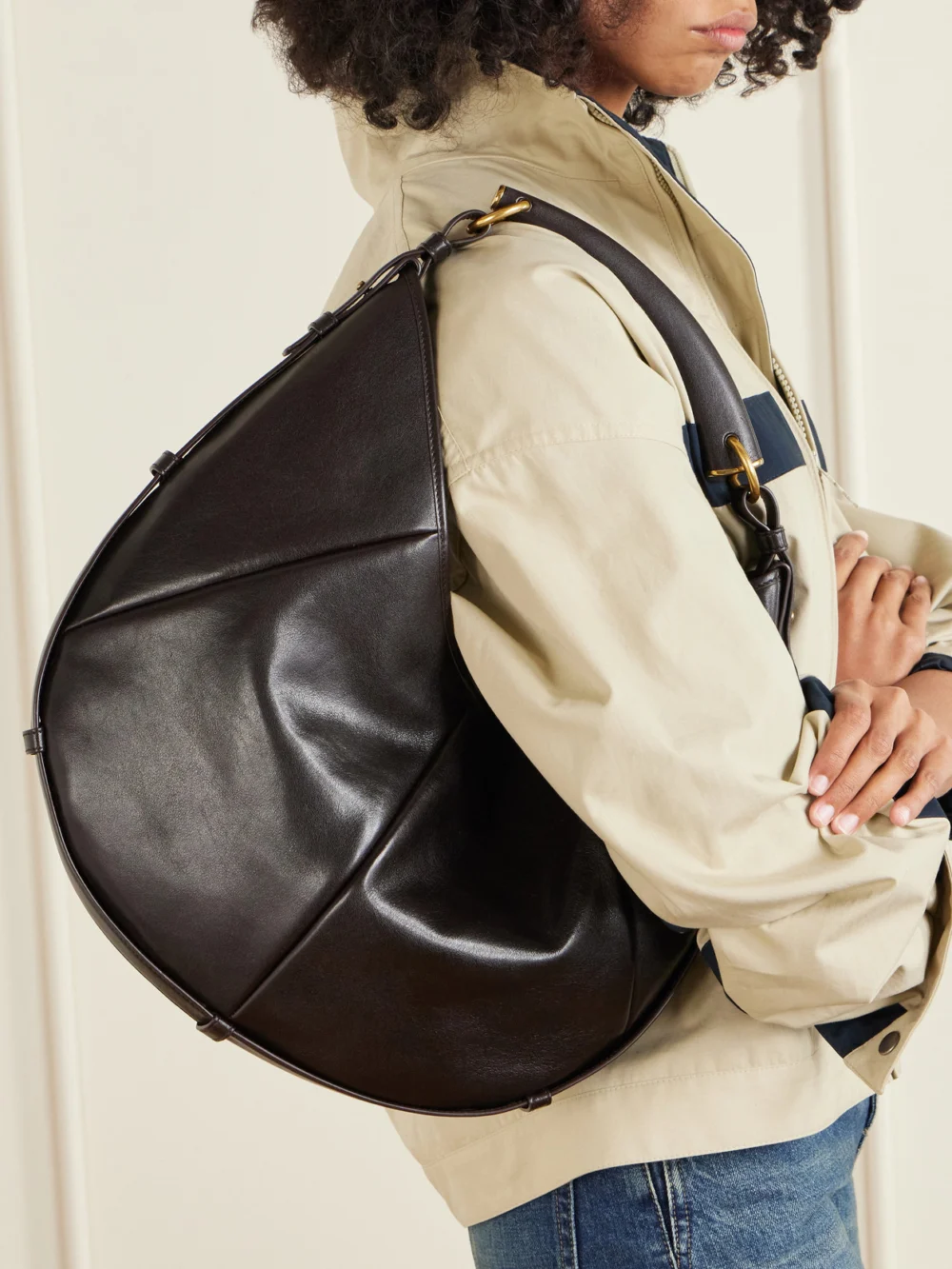 Saint Laurent Mombasa Paneled Leather Shoulder Bag, styled view