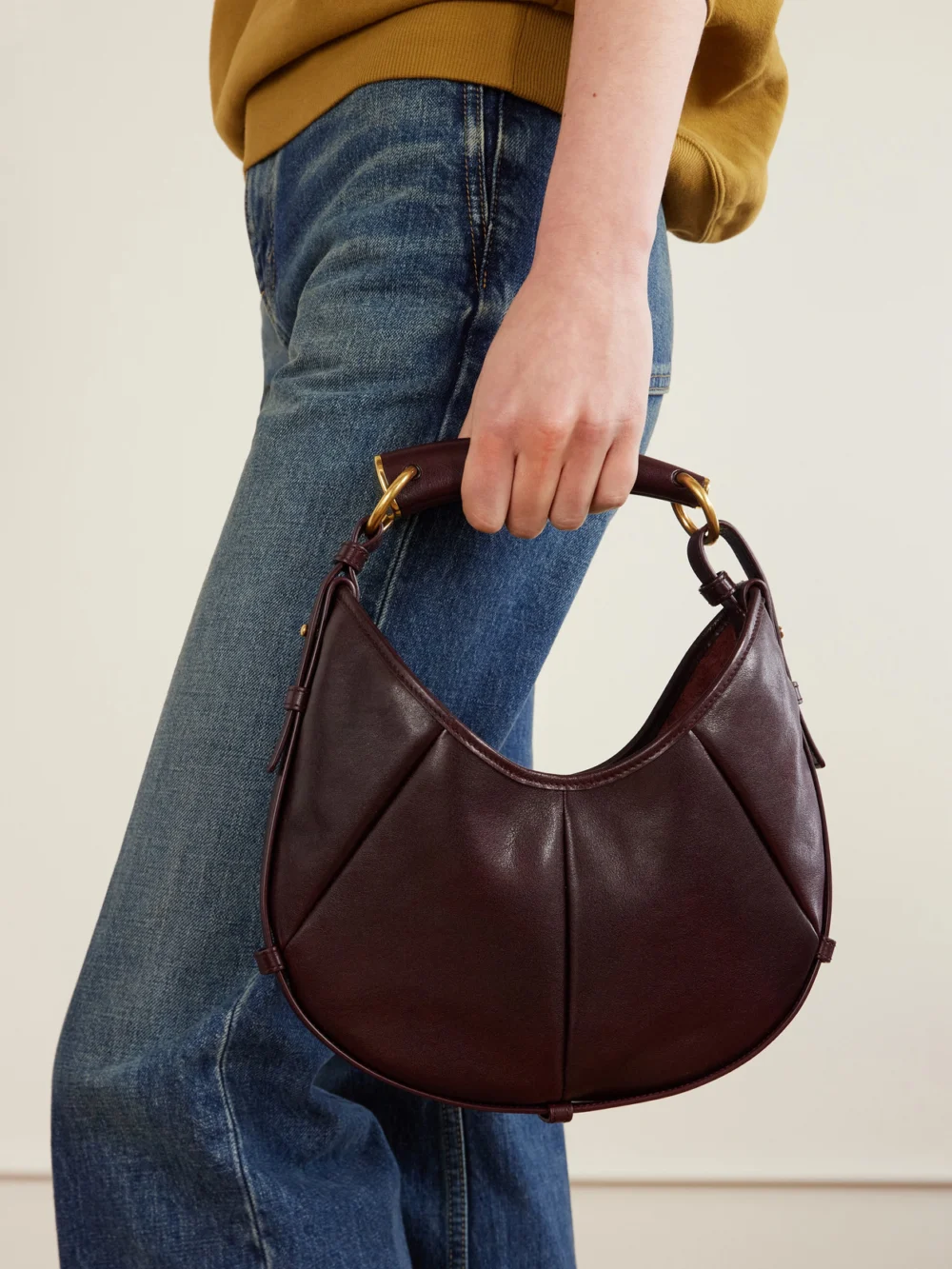 Saint Laurent Mombasa Paneled Leather Shoulder Bag, styled view