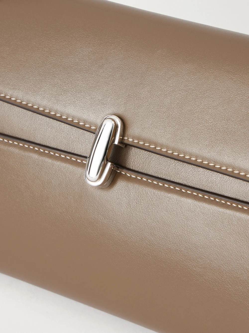 Close-up detail of the Savette Symmetry Trapeze Leather Shoulder Bag