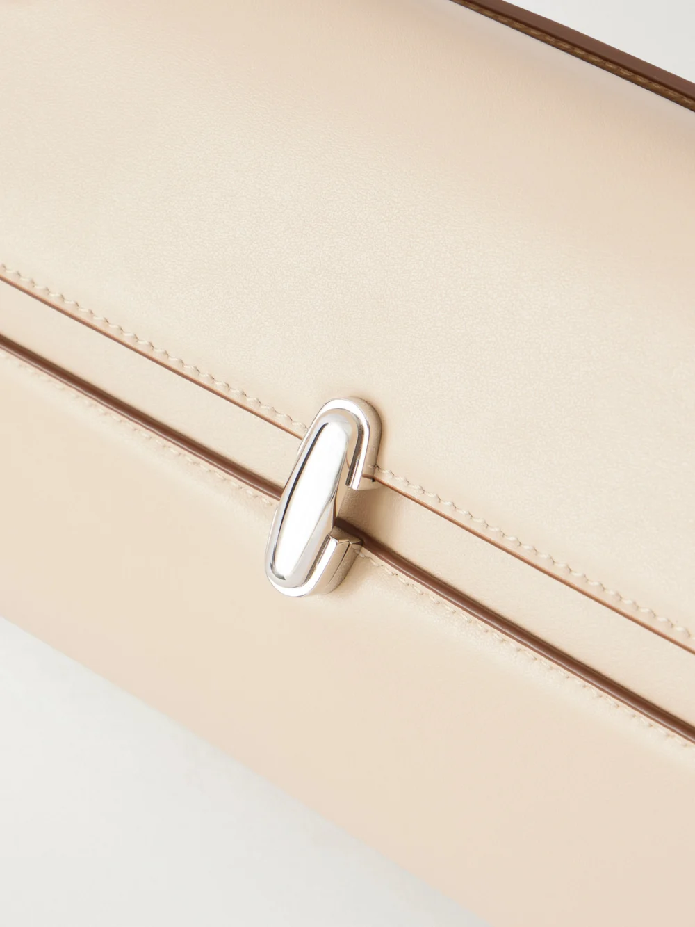 Close-up detail of the Savette Symmetry Trapeze Leather Shoulder Bag
