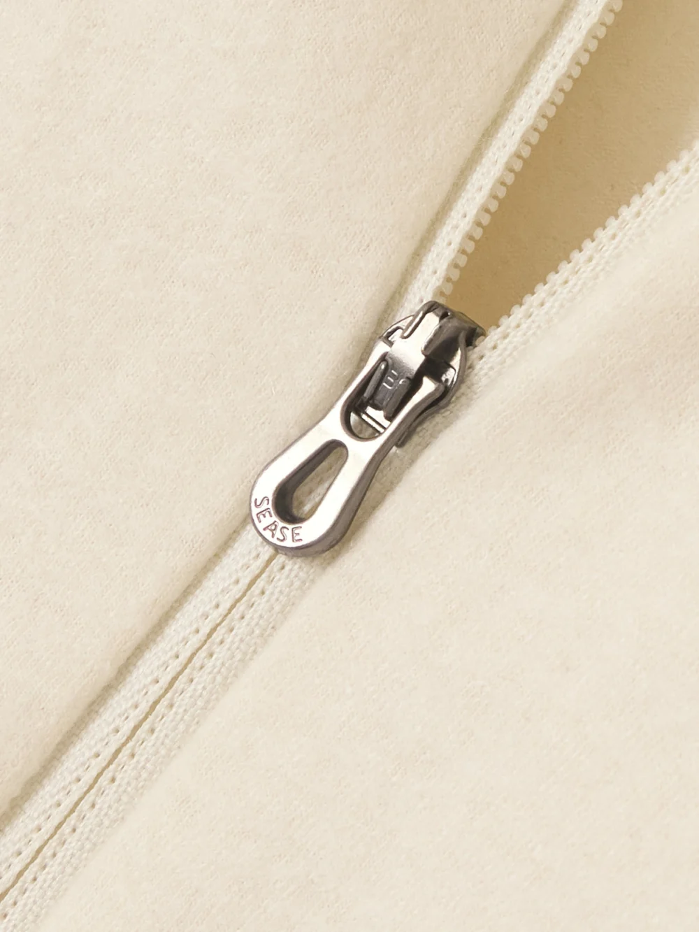 Close-up detail of the Sease Ariel Fleece Ski Top