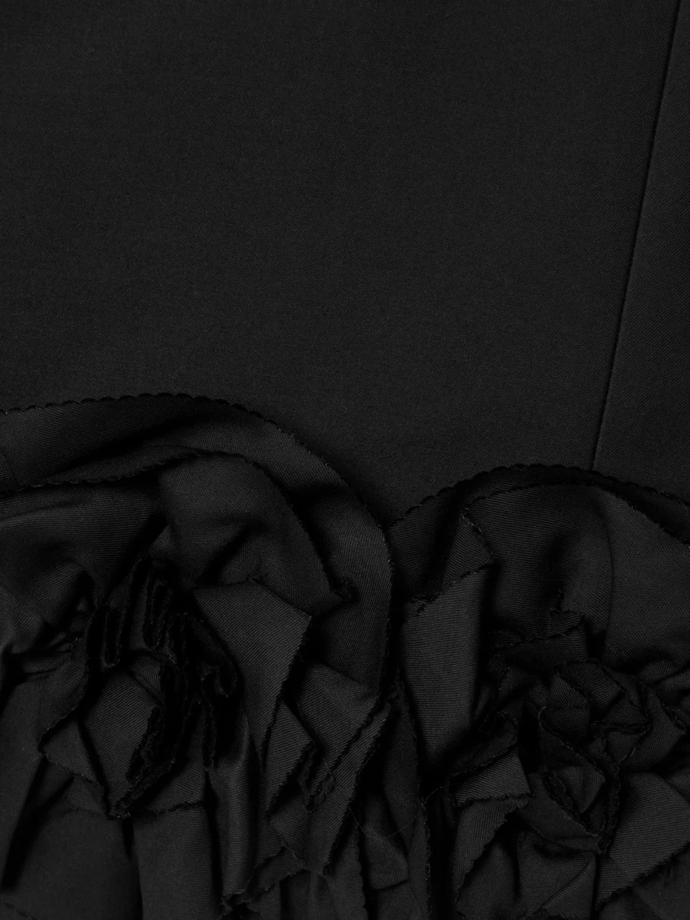 Close-up detail of the Shushu/Tong Appliquéd Bow-embellished Twill Mini Dress