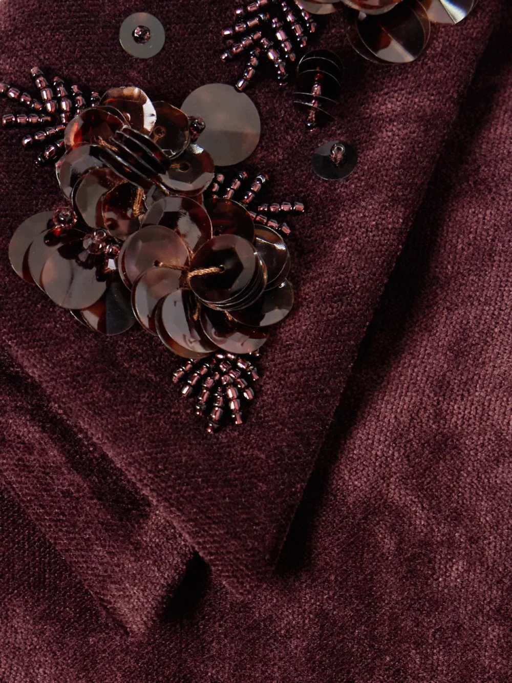 Close-up detail of the Shushu/Tong Cropped Embellished Velvet Jacket