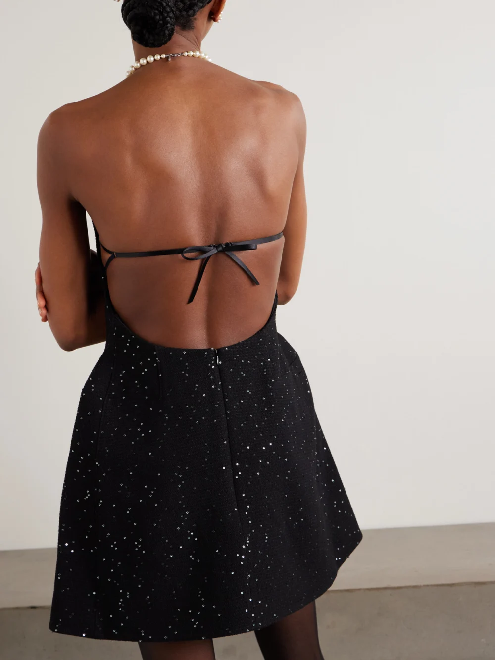 Back view of the Shushu/Tong Strapless Bow-detailed Sequin-embellished Wool-blend Mini Dress